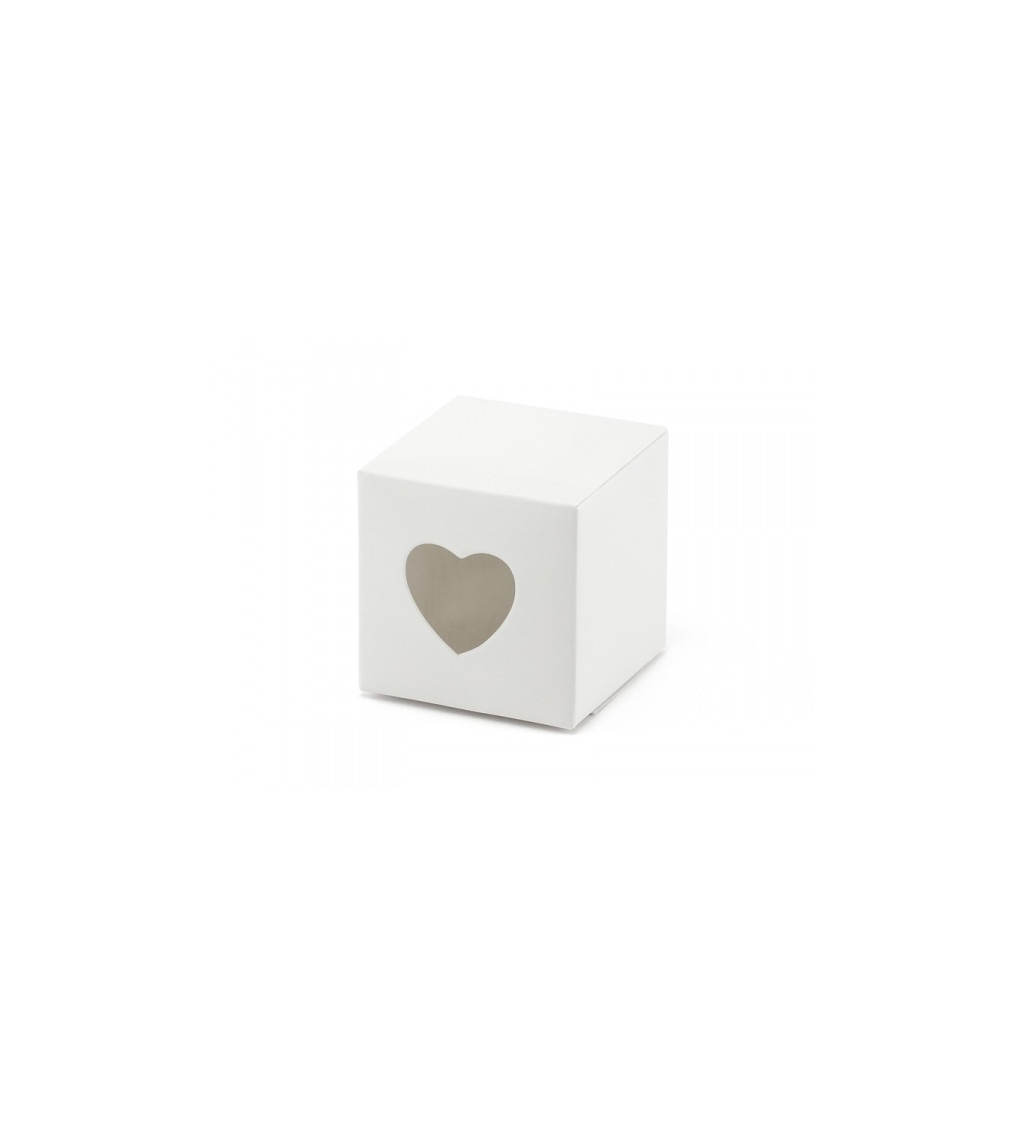Krabička v bielej farbe s vystrihnutým srdcom.