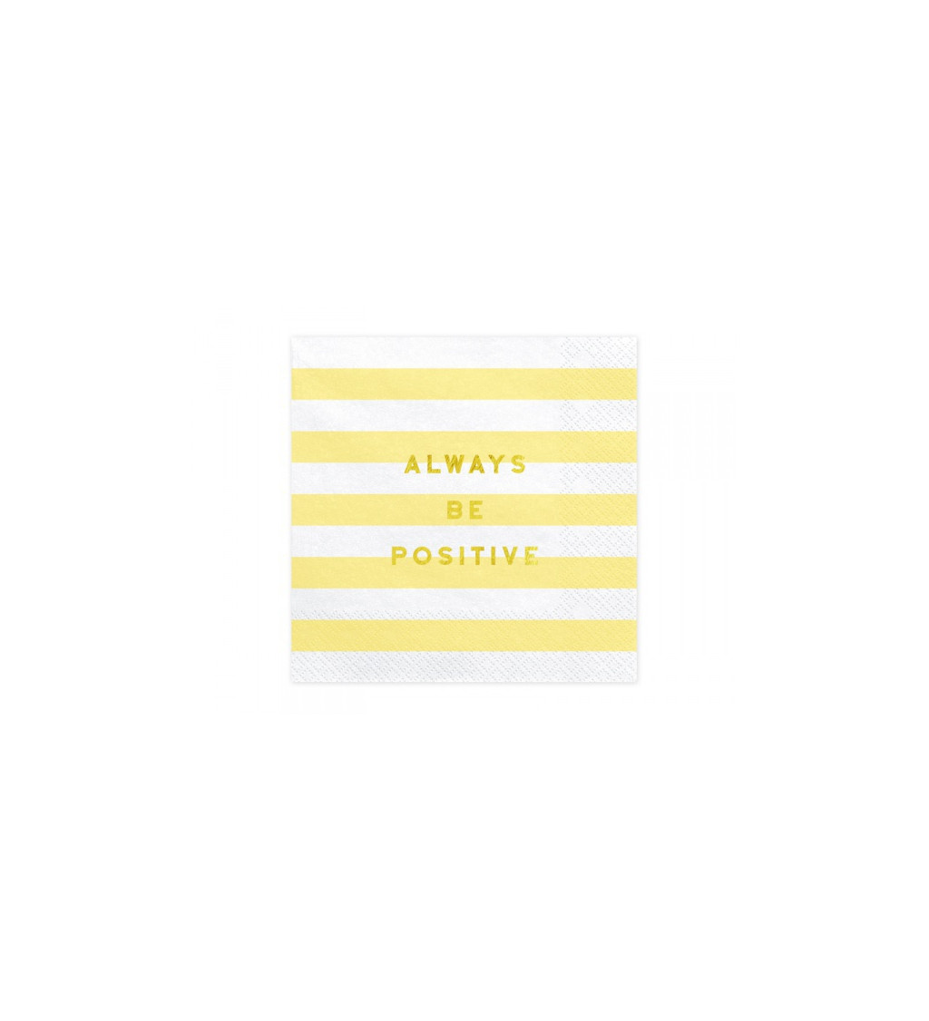 Papierové obrúsky v bielej farbe so žltými pruhmi a nápisom "Always be positive"